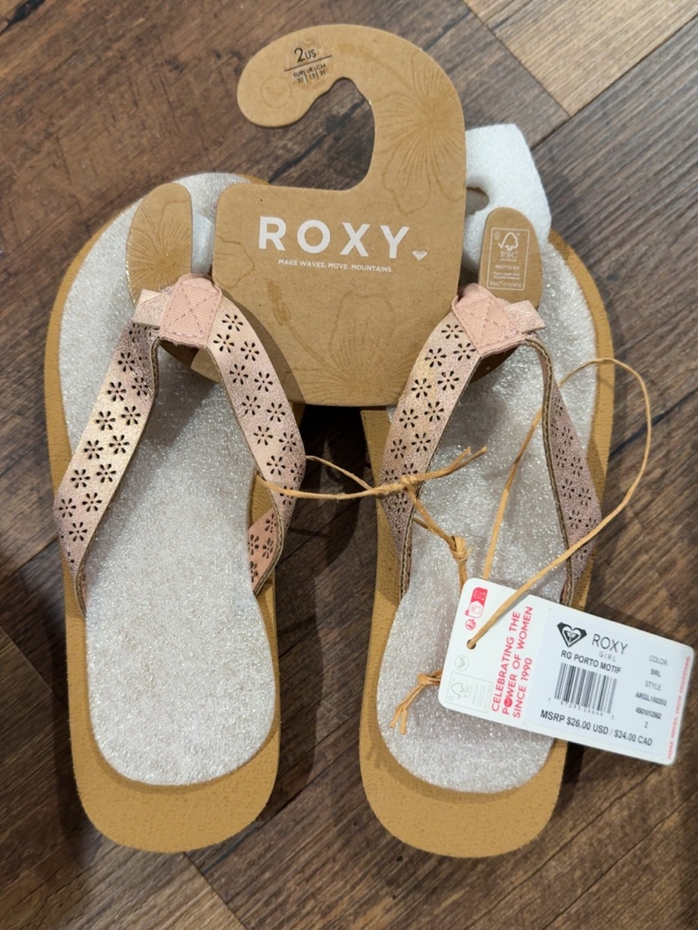 Roxy Girls’ rose gold Flip Flops